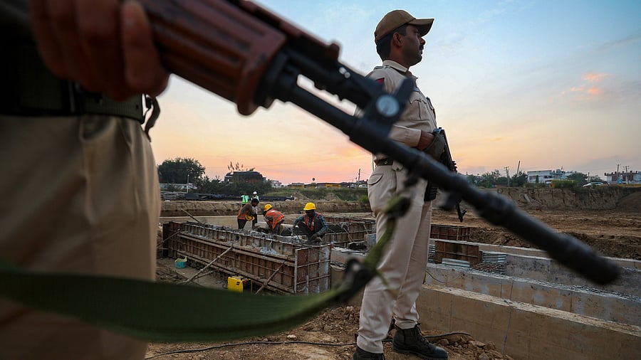 <div class="paragraphs"><p>Security personnel stand guard along the Samba Highway road project following the recent terrorist attack, at Gagangir of Ganderbal district, Thursday.</p></div>