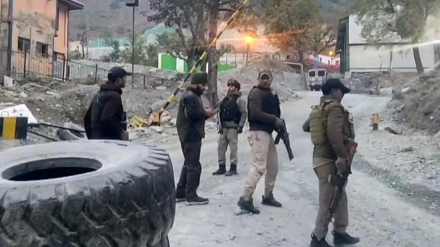 <div class="paragraphs"><p>Security personnel cordon off the area after a terrorist attack, in Ganderbal district, Jammu & Kashmir.</p></div>