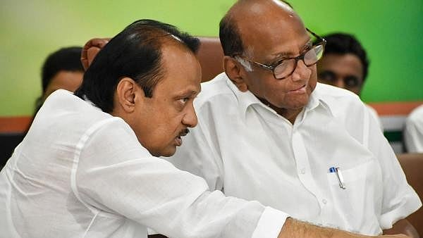 <div class="paragraphs"><p>Sharad Pawar with Ajit Pawar. </p></div>