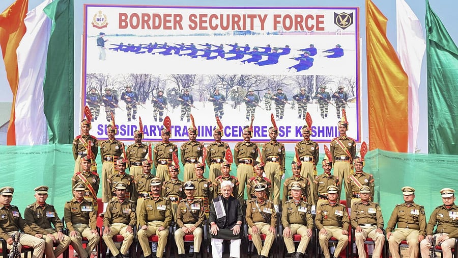 <div class="paragraphs"><p>J&K LG Manoj Sinha with other BSF officers poses for group photo during the passing out parade of BSF recruit constables, in Humhama, Budgam district, Jammu and Kashmir. </p></div>