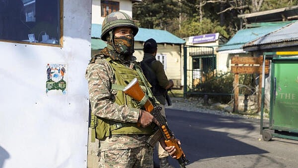 <div class="paragraphs"><p>Security personnel stand guard in J&K</p></div>