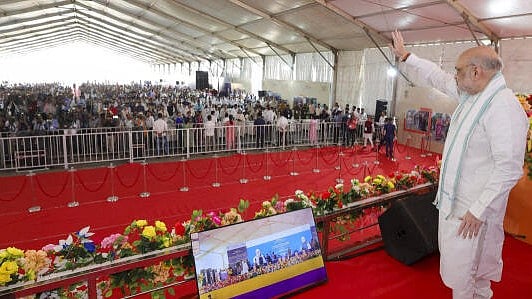 <div class="paragraphs"><p>Union Home Minister Amit Shah addresses during the inauguration of a passenger terminal and cargo gate, at Petrapole Border.</p></div>