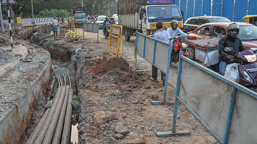 <div class="paragraphs"><p>A portion of the new Cantonment Station Road has been dug up to lay underground water and power lines. </p></div>