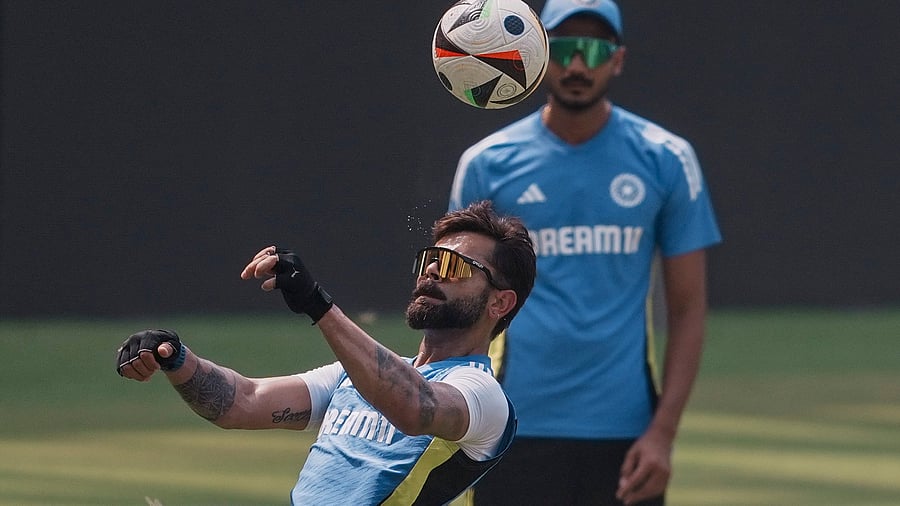 <div class="paragraphs"><p> India's Virat Kohli during a practice session ahead of the third Test cricket match against New Zealand, at Wankhede Stadium in Mumbai, Wednesday. </p></div>