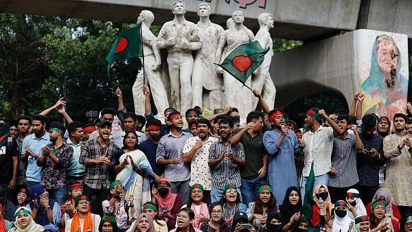 <div class="paragraphs"><p>Bangladeshis protesting against Sheikh Hasina. File Photo</p></div>