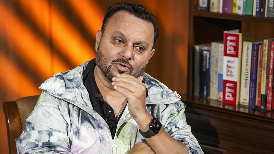 <div class="paragraphs"><p>Anil Sharma gestures during an interview with&nbsp;</p></div>