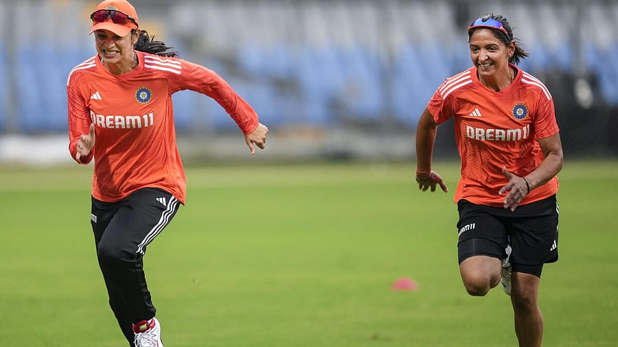 <div class="paragraphs"><p>File photo of Harmanpreet Kaur and teammate Smriti Mandhana during a practice session. </p></div>