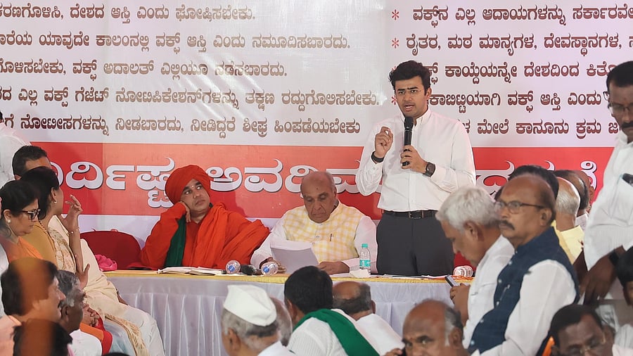 <div class="paragraphs"><p>Tejasvi Surya addresses the gathering with Jagdambika Pal (centre). </p></div>