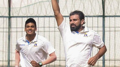 <div class="paragraphs"><p>Bengal’s Mohammed Shami celebrates a wicket on the second day of a Ranji Trophy cricket match between Madhya Pradesh and Bengal, at the Holkar Cricket Stadium, in Indore.</p></div>