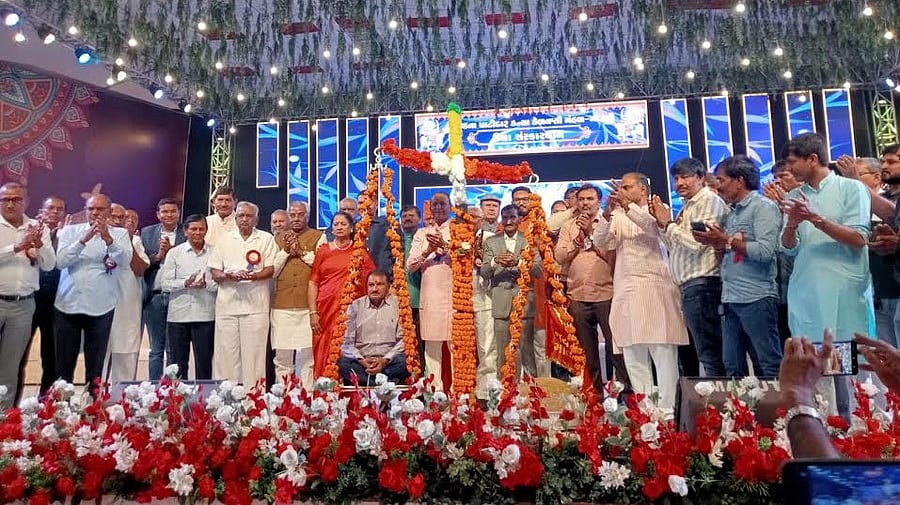 <div class="paragraphs"><p>Jaysukh Patel, the industrialist accused in the Morbi bridge collapse, weighed in modak (sweet dumpling) on a scale at the function organised by Kadva Patidar Kanya Kelavani Mandal.</p></div>