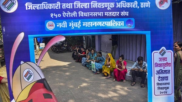 <div class="paragraphs"><p>Voters at a polling booth during the Maharashtra Assembly elections, in Navi Mumbai, on Wednesday.</p></div>