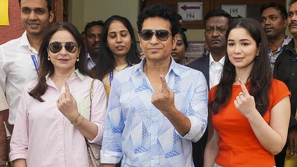 <div class="paragraphs"><p>Former cricketer Sachin Tendulkar, wife Anjali and daughter Sara show their fingers marked with indelible ink after casting votes at a polling station during the Maharashtra Assembly elections, in Mumbai on Wednesday.</p></div>