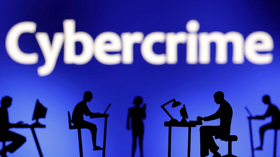 <div class="paragraphs"><p>Figurines with computers and smartphones are seen in front the word "Cybercrime" in this illustration taken.</p></div>