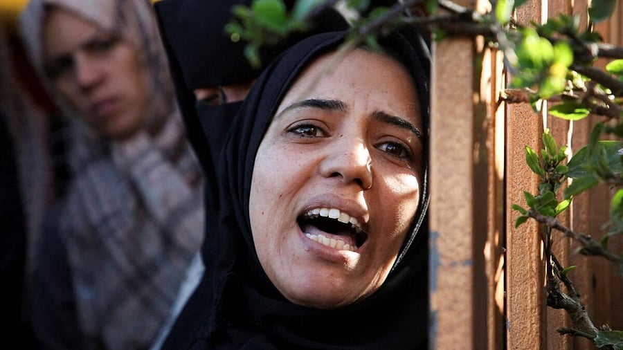 <div class="paragraphs"><p>Palestinians mourn loved ones killed in Israeli strikes, in Khan Younis in the southern Gaza Strip.</p></div>