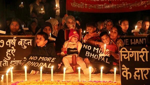 <div class="paragraphs"><p>Children with congenital disabilities, believed to be caused by the exposure of their parents to gas leakage during the Union Carbide gas leak disaster in 1984 take part in a candlelight vigil to pay homage to the victims of the tragedy, in Bhopal.</p></div>