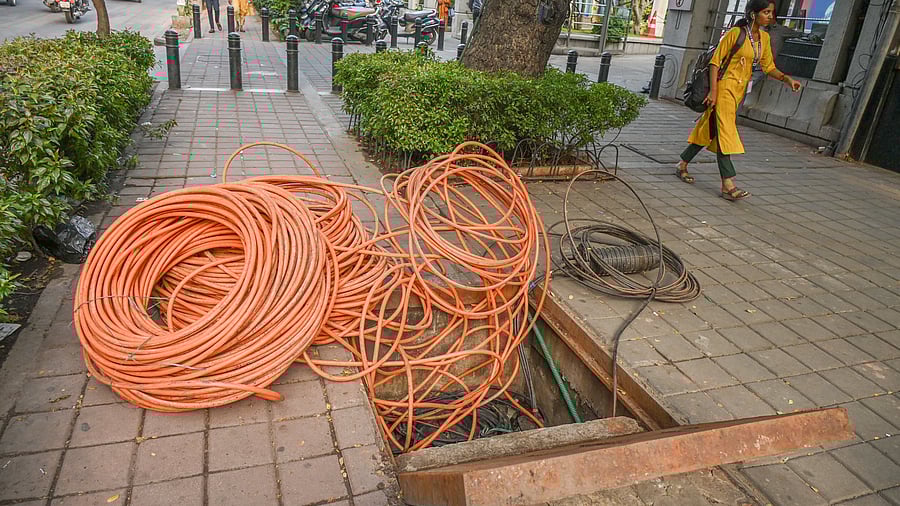 <div class="paragraphs"><p>Optical fibre cables on footpaths can cause problems for pedestrians and motorists. This is at Residency Road. </p></div>