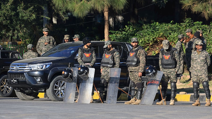 <div class="paragraphs"><p>Pakistani Rangers guard the area, after security forces launched a raid on supporters of the former Pakistani Prime Minister Imran Khan's party Pakistan Tehreek-e-Insaf (PTI)&nbsp;</p></div>