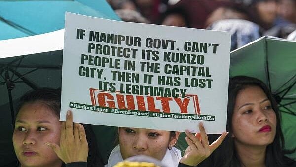 <div class="paragraphs"><p>Kuki Students’ Organisation members protest at Jantar Mantar against the alleged genocide campaign against the Kuki-Zo with a demand for urgent establishment of a Union Territory with a legislature for the Kuki-Zo, in New Delhi.</p></div>