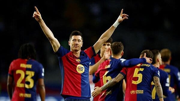 <div class="paragraphs"><p>Champions League - FC Barcelona v Brest - Estadi Olimpic Lluis Companys, Barcelona, Spain - November 26, 2024 - FC Barcelona's Robert Lewandowski celebrates after the match.</p></div>