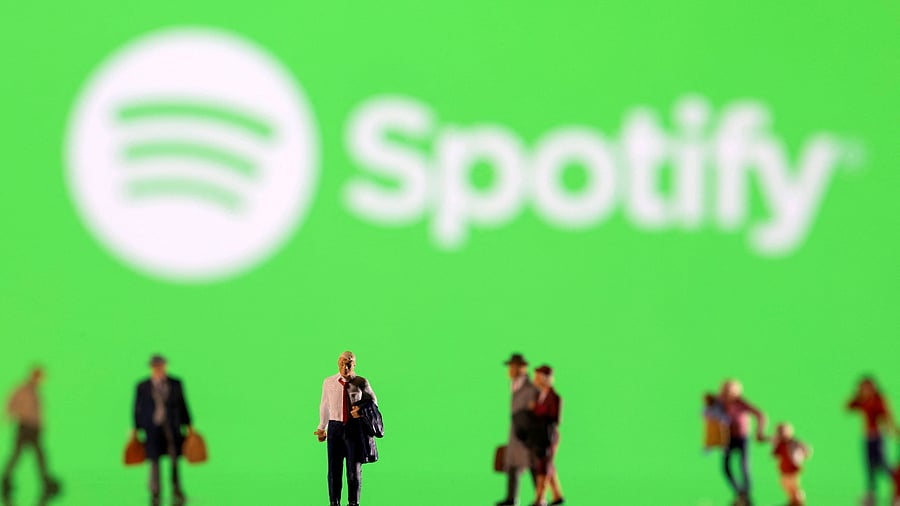 <div class="paragraphs"><p>FILE PHOTO: Small figurines are seen in front of displayed Spotify logo in this illustration.</p></div>