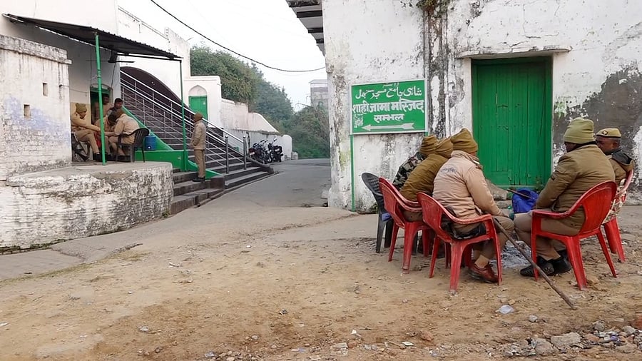 <div class="paragraphs"><p>Police personnel keep a vigil near Shahi Jama Masjid, in Sambhal, Uttar Pradesh, Wednesday, Nov. 27, 2024. Two days after violence broke out during a court-ordered survey of a Mughal-era mosque, life in Sambhal was gradually returning to normal on Tuesday with schools reopening and several shops selling daily essentials resuming operations.</p></div>