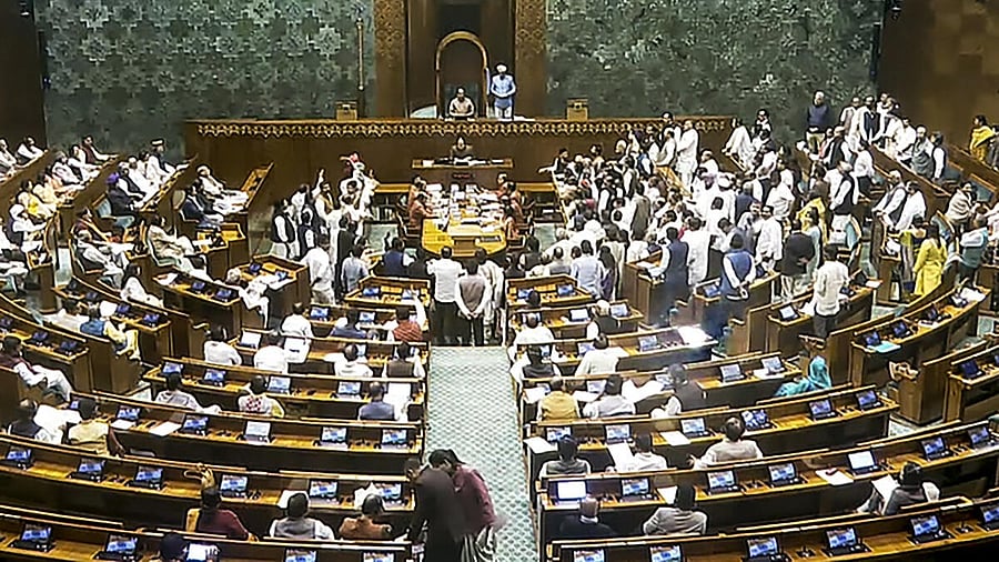 <div class="paragraphs"><p>Opposition members protest in the Lok Sabha during the Winter session of Parliament, in New Delhi, Thursday, Nov. 28, 2024.</p></div>
