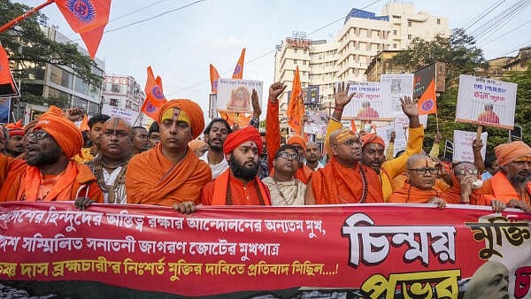 <div class="paragraphs"><p>Activists of Hindu Jagaran Mancha participate in a rally to protest over arrest of Chinmoy Krishna Das by the Bangladesh police, in Kolkata.</p></div>