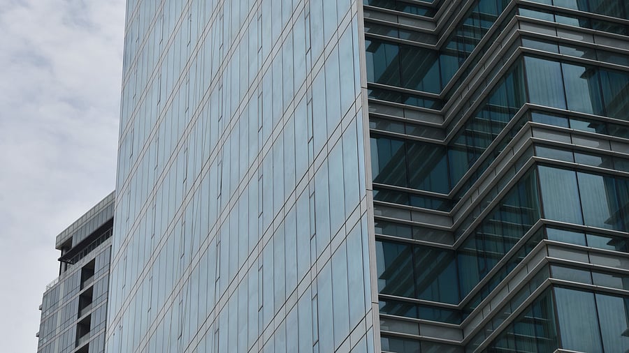 <div class="paragraphs"><p>A window cleaner cleaning a window without fear on a skyscraper at Bellary road in Bengaluru. </p></div>
