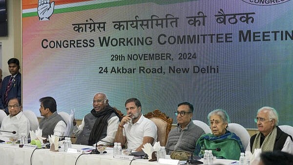 <div class="paragraphs"><p>Congress President Mallikarjun Kharge with LoP in the Lok Sabha and party leader Rahul Gandhi, party leaders Ajay Maken, KC Venugopal, P Chidambaram, and others during the Congress Working Committee meeting, at the AICC headquarters in New Delhi, on Friday.</p></div>