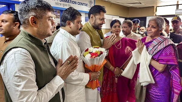 <div class="paragraphs"><p>Union Finance Minister Nirmala Sitharaman being welcomed by BJP workers upon her arrival at the Jayprakash Narayan International Airport, in Patna. </p></div>