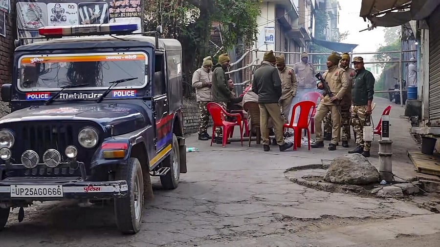 <div class="paragraphs"><p>Police personnel continue to keep vigil near the Jama Masjid, in Sambhal district of Uttar Pradesh, Thursday, Nov. 28, 2024. Violence erupted in Sambhal on Sunday when a large crowd gathered near the mosque and began chanting slogans as a survey team resumed its work.</p></div>