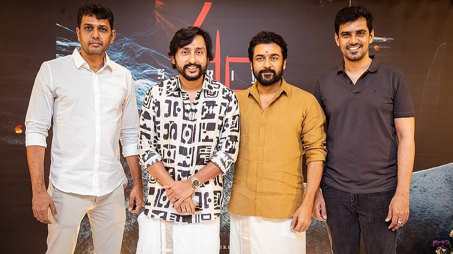 <div class="paragraphs"><p>Suriya poses with director RJ Balaji and producers SR Prakash Babu and SR Prabhu.</p></div>