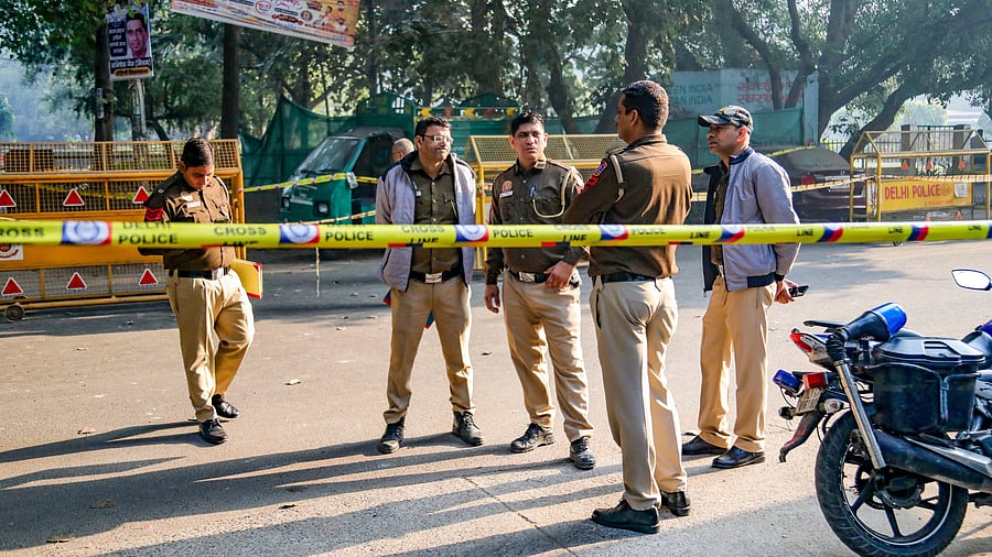 <div class="paragraphs"><p>New Delhi: Police personnel stand guard near a cordoned area where a low-intensity blast occurred on Thursday near a cinema hall at Rohini area, in New Delhi, Friday, Nov. 29, 2024.</p></div>