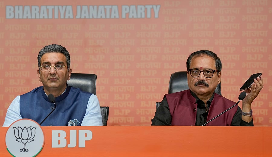 <div class="paragraphs"><p>Delhi BJP President Virendra Sachdeva and BJP national spokesperson Gaurav Bhatia address a press conference at party headquarters, in New Delhi, Saturday, Nov. 30, 2024. </p></div>