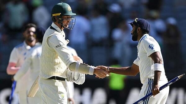 <div class="paragraphs"><p>Australia's Josh Hazlewood shakes hands with India's Jasprit Bumrah after the 1st Test match of the BGT.</p></div>