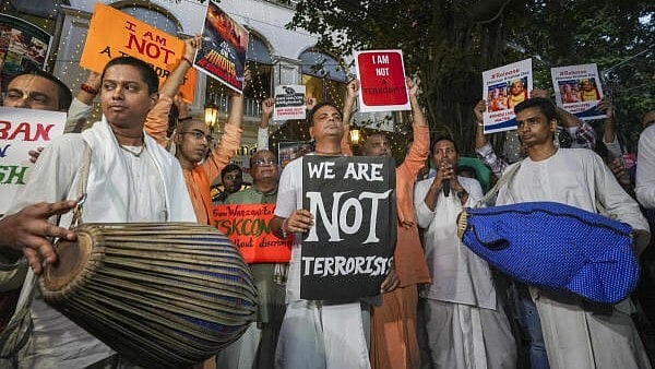 <div class="paragraphs"><p>ISKCON monks take part in a protest 'kirtan' over the arrest of Hindu monk Chinmoy Krishna Das Prabhu by Bangladesh police, in Kolkata, West Bengal.</p></div>
