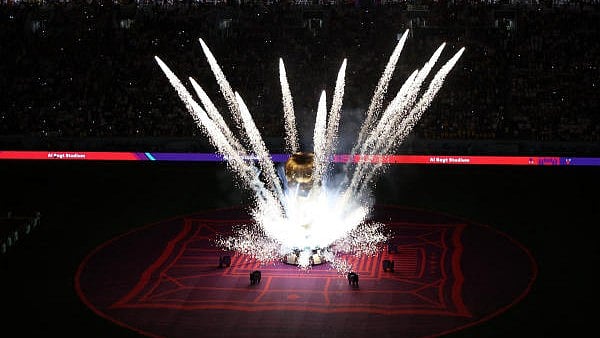 <div class="paragraphs"><p>A FIFA World Cup trophy replica is seen on the pitch before the match in 2022.</p></div>