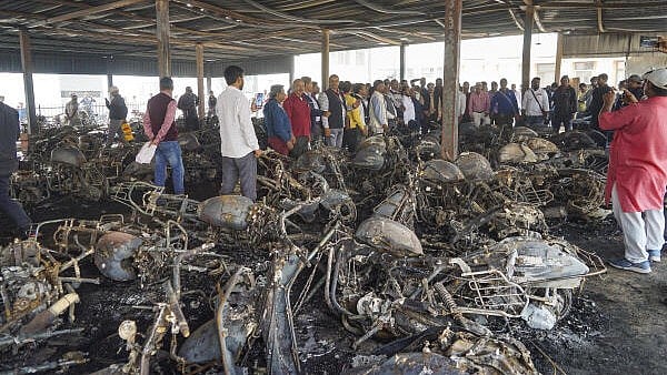 <div class="paragraphs"><p>Charred remains of vehicles after a fire broke out at a parking stand at Varanasi Cantt railway station due to short circuit, in Varanasi, Uttar Pradesh, Saturday, Nov. 30, 2024. More than 150 two-wheelers were gutted in the fire. </p></div>