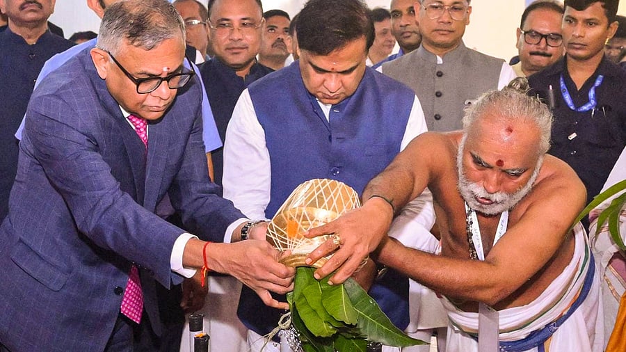 <div class="paragraphs"><p>Assam Chief Minister Himanta Biswa Sarma and Chairman of Tata Sons Limited N Chandrasekaran offer prayers during the ‘Bhumi pujan’ for the Rs 27,000 crore semiconductor assembly and test facility at Jagiroad, in Morigaon district.</p></div>