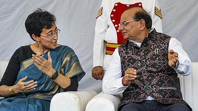 <div class="paragraphs"><p>Delhi Lt Governor VK Saxena with Delhi CM Atishi</p></div>