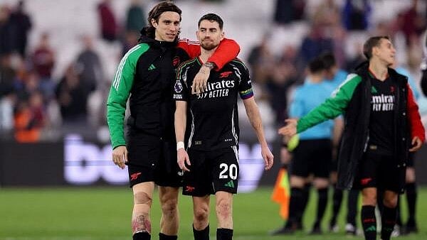 <div class="paragraphs"><p>Arsenal's Riccardo Calafiori and Arsenal's Jorginho celebrate after the match.</p></div>