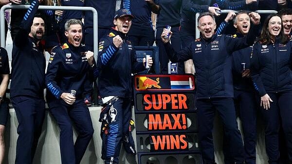 <div class="paragraphs"><p>Red Bull's Max Verstappen celebrates with Red Bull team principal Christian Horner after winning the Qatar Grand Prix.</p></div>