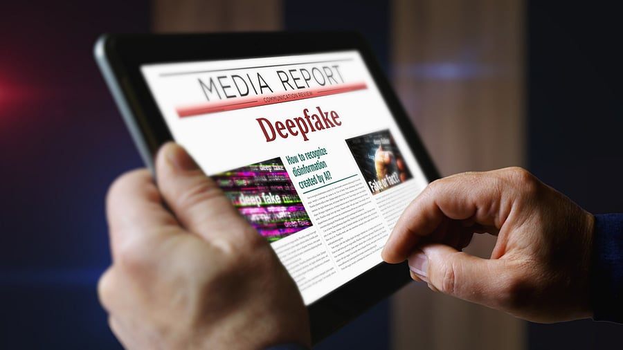 <div class="paragraphs"><p>Representative image showing a person reading a report on 'Deepfake'</p></div>
