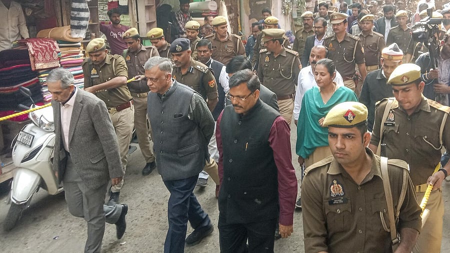 <div class="paragraphs"><p>A three-member judicial commission comprising retired Allahabad High Court judge Devendra Kumar Arora, retired IAS officer Amit Mohan Prasad and retired IPS officer Arvind Kumar Jain visits the Shahi Jama Masjid, in Sambhal, Uttar Pradesh</p></div>