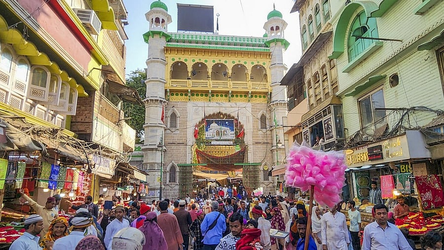 <div class="paragraphs"><p>People outside the Ajmer Sharif Dargah, Shrine of Moinuddin Chishti, in Ajmer, Rajasthan, Thursday, Nov. 28, 2024. A court in Ajmer has issued notices in a civil suit claiming that there is a Shiva temple in the dargah of Sufi saint Moinuddin Chishti. </p></div>