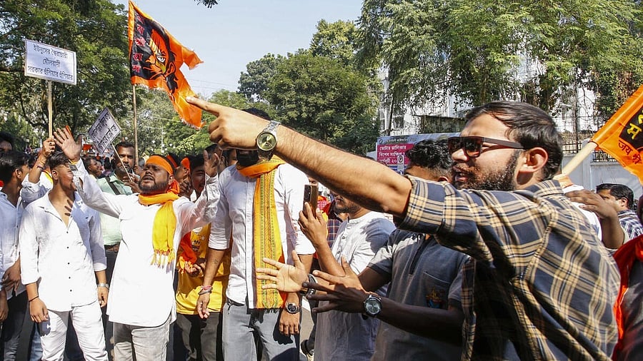 <div class="paragraphs"><p>Activists from the Hindu community stage a protest over alleged atrocities on Hindus in Bangladesh, in Agartala, Monday, Dec. 2, 2024.</p></div>