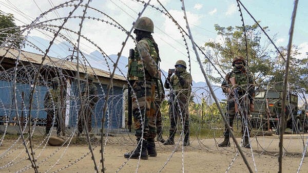 <div class="paragraphs"><p>ecurity personnel stand guard during a protest at Leimakhong, in Kangpokpi district.</p></div>