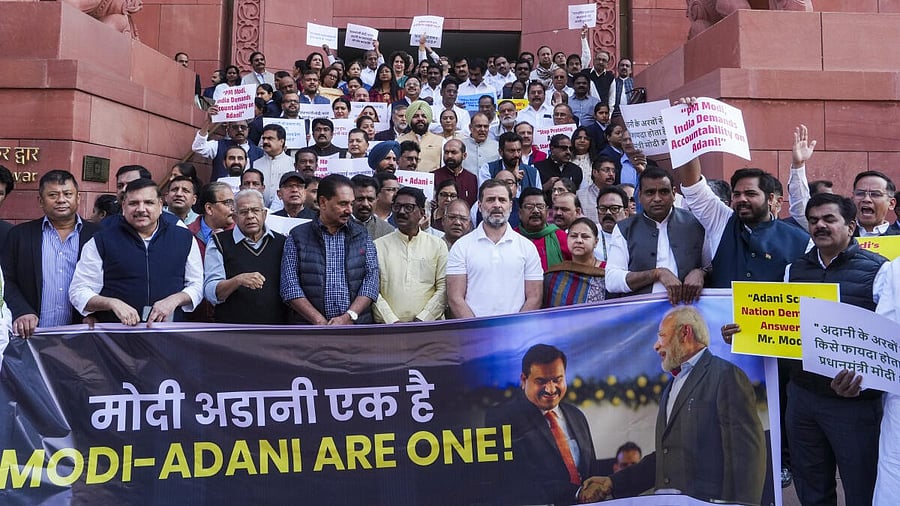 <div class="paragraphs"><p>Leader of Opposition in Lok Sabha Rahul Gandhi and other opposition MPs stage a protest during the Winter session of Parliament, in New Delhi, Tuesday. </p></div>