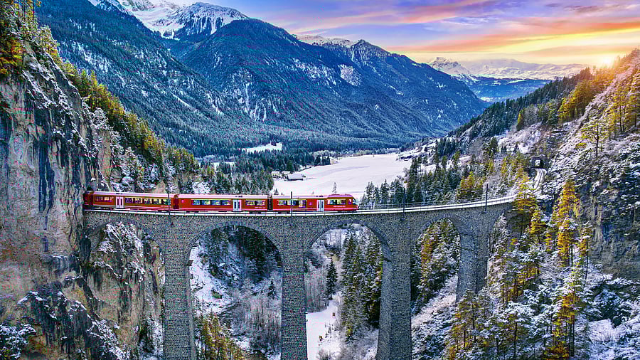 <div class="paragraphs"><p>Aerial view of Train passing through famous mountain in Filisur, Switzerland. </p></div>