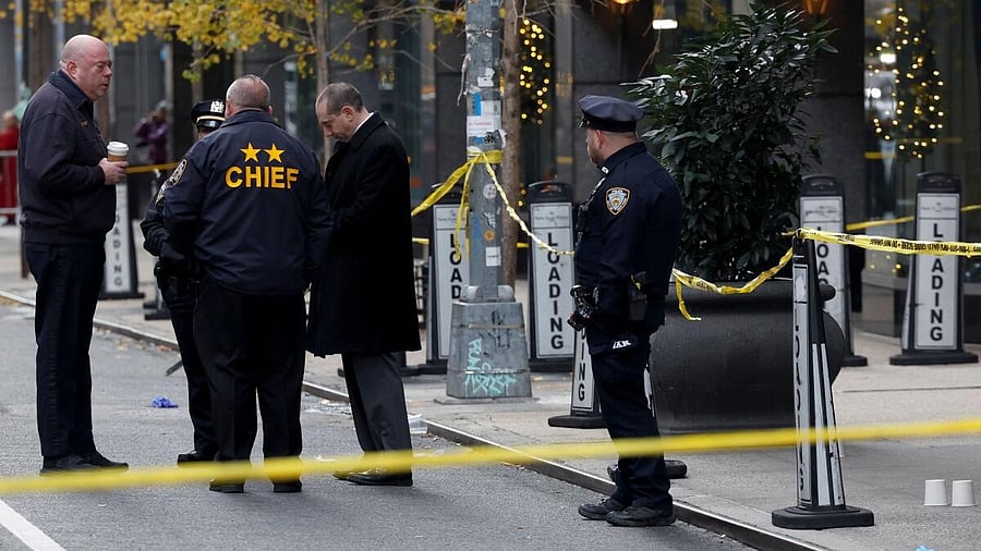 <div class="paragraphs"><p>Police officers stand near the scene where the CEO of United Healthcare Brian Thompson was reportedly shot and killed in Midtown Manhattan, in New York City.</p></div>